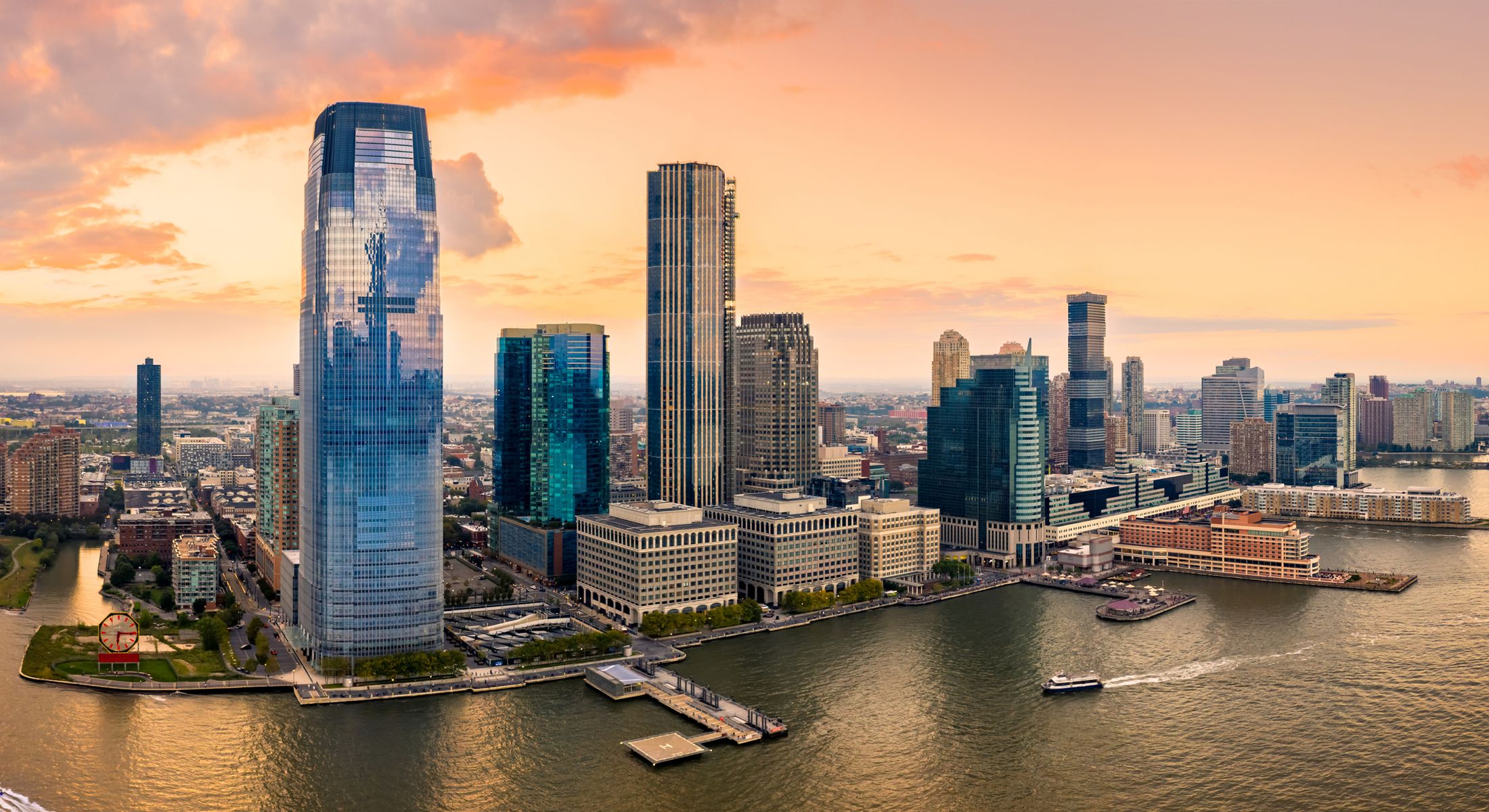 Skyline view of a city at sunset.